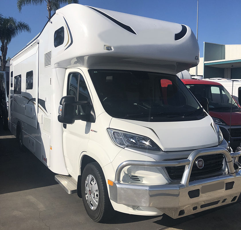 Photograph of front view of a motorhome
