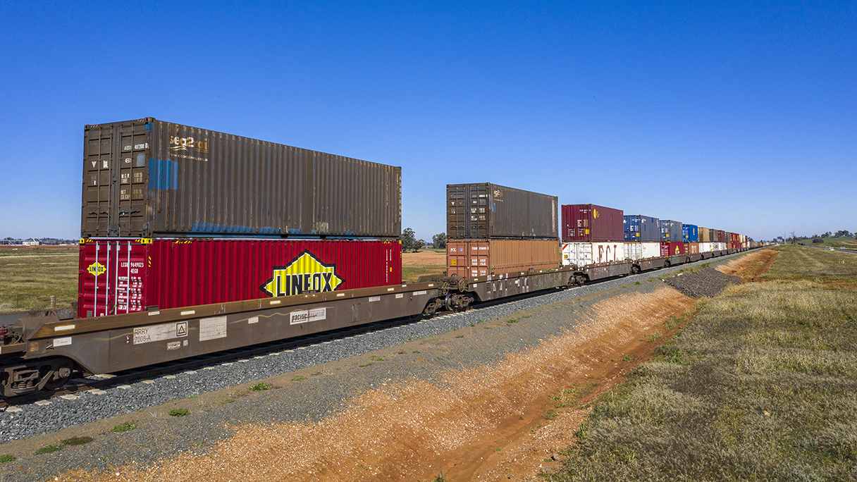 Trains double stacked with shipping containers