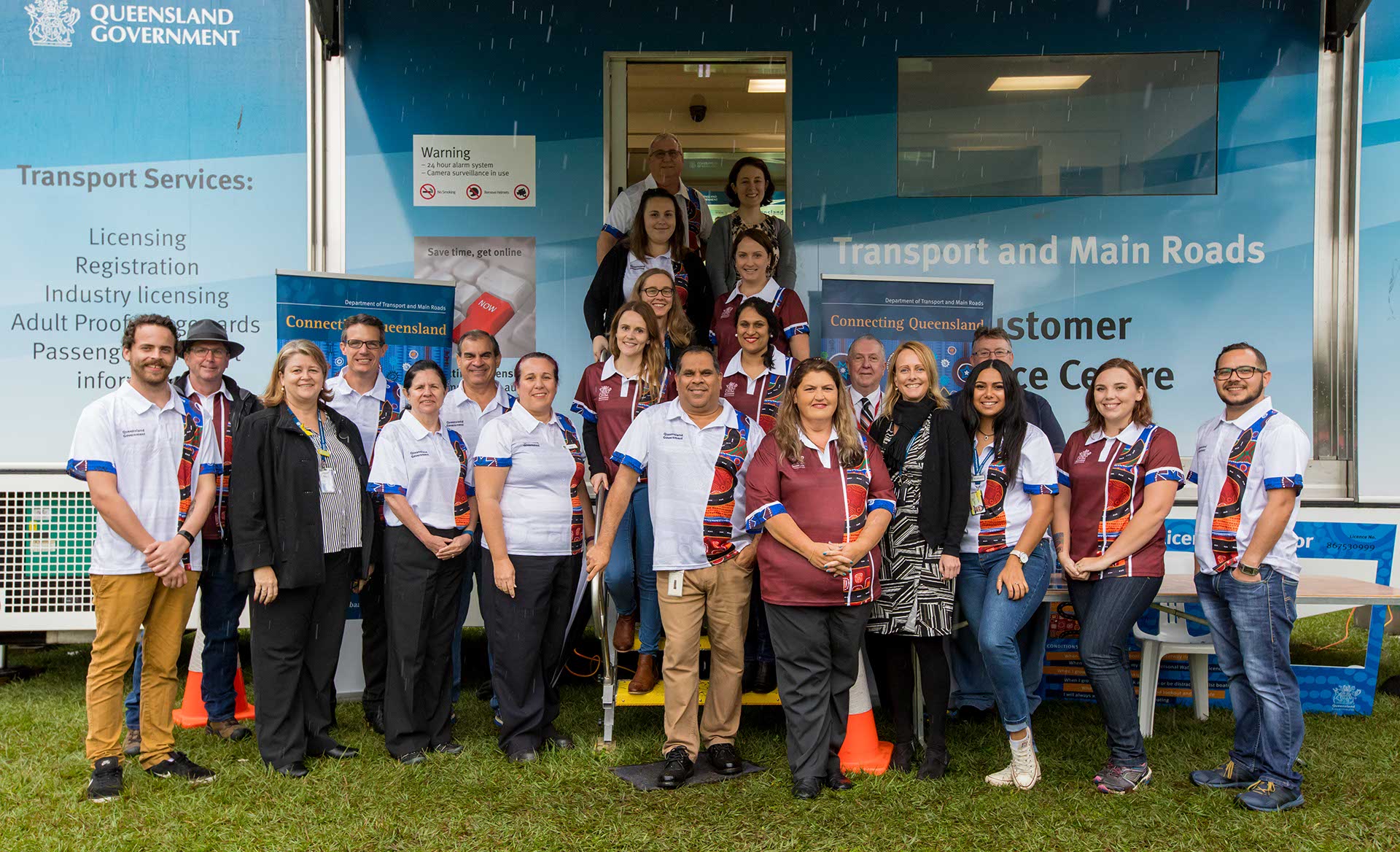 Employees with mobile Customer Service Centre (CSC) at NAIDOC Week 2017 event.