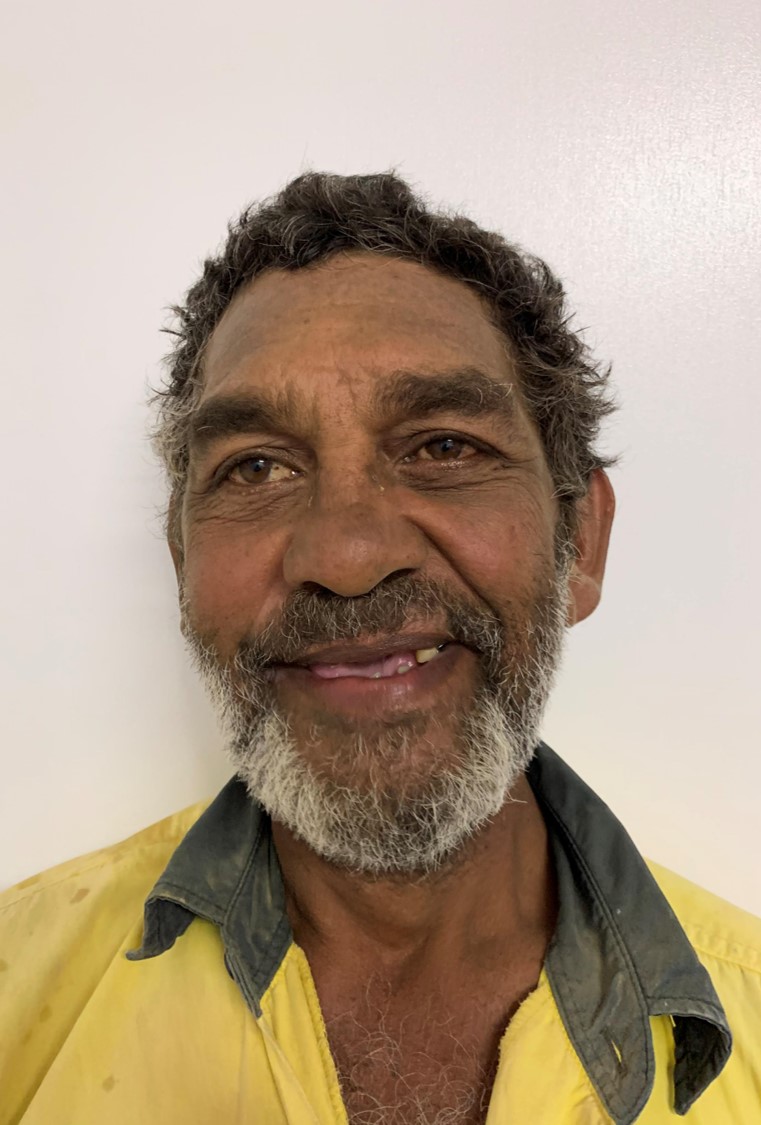 A person in a yellow shirt