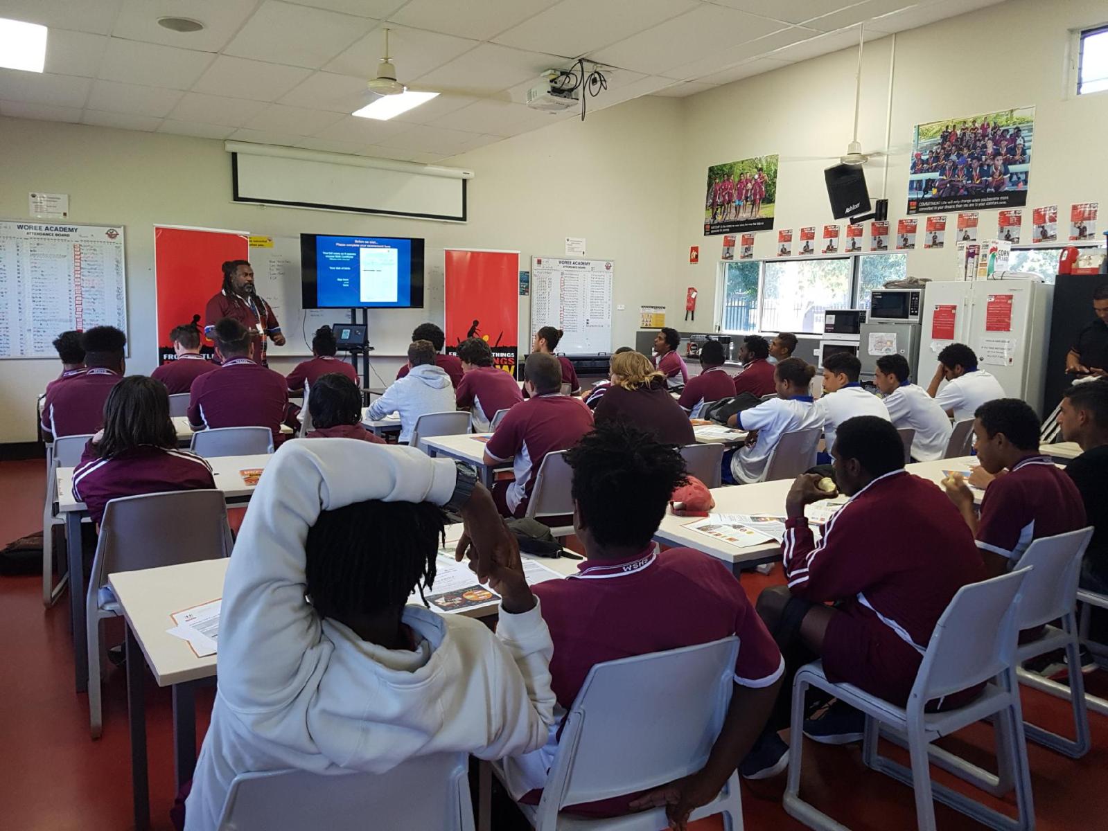 Barry Lea, Driver Examiner/Principal Customer Service Officer running a driver licensing workshop for students at Woree State High School