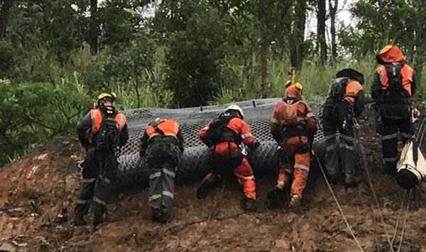 Preparing to lay mesh on the upslope.