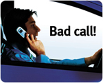 An image of a man talking on a hand held mobile phone while driving, displaying the words 'Bad call!'