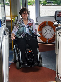 Ms Wendy Lovelace in a wheelchair