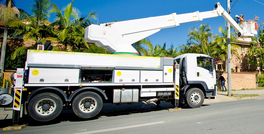 Photograph of a cherry picker from side view
