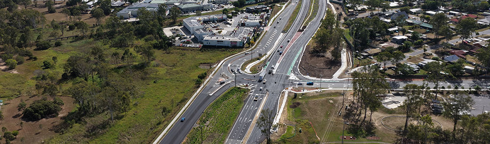 Overhead view of the completed Mount Lindesay Highway upgrade in Jimboomba showing a 4-lane highway, walking and bike riding paths