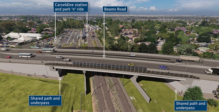 View of new overpass looking towards Bracken Ridge showing the overpass crossing the existing train lines with the Carseldine station and park 'n' ride facility to the top of the image. Image shows new shared path underpasses on either side of the train lines. 