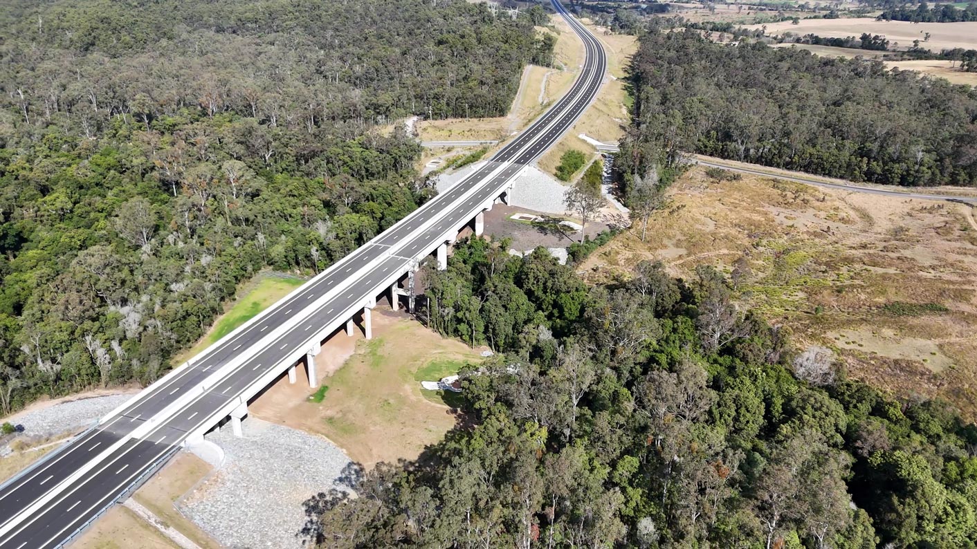 Aerial image of the new Gympie Bypass Six Mile Creek bridges travelling south with bushland near highway