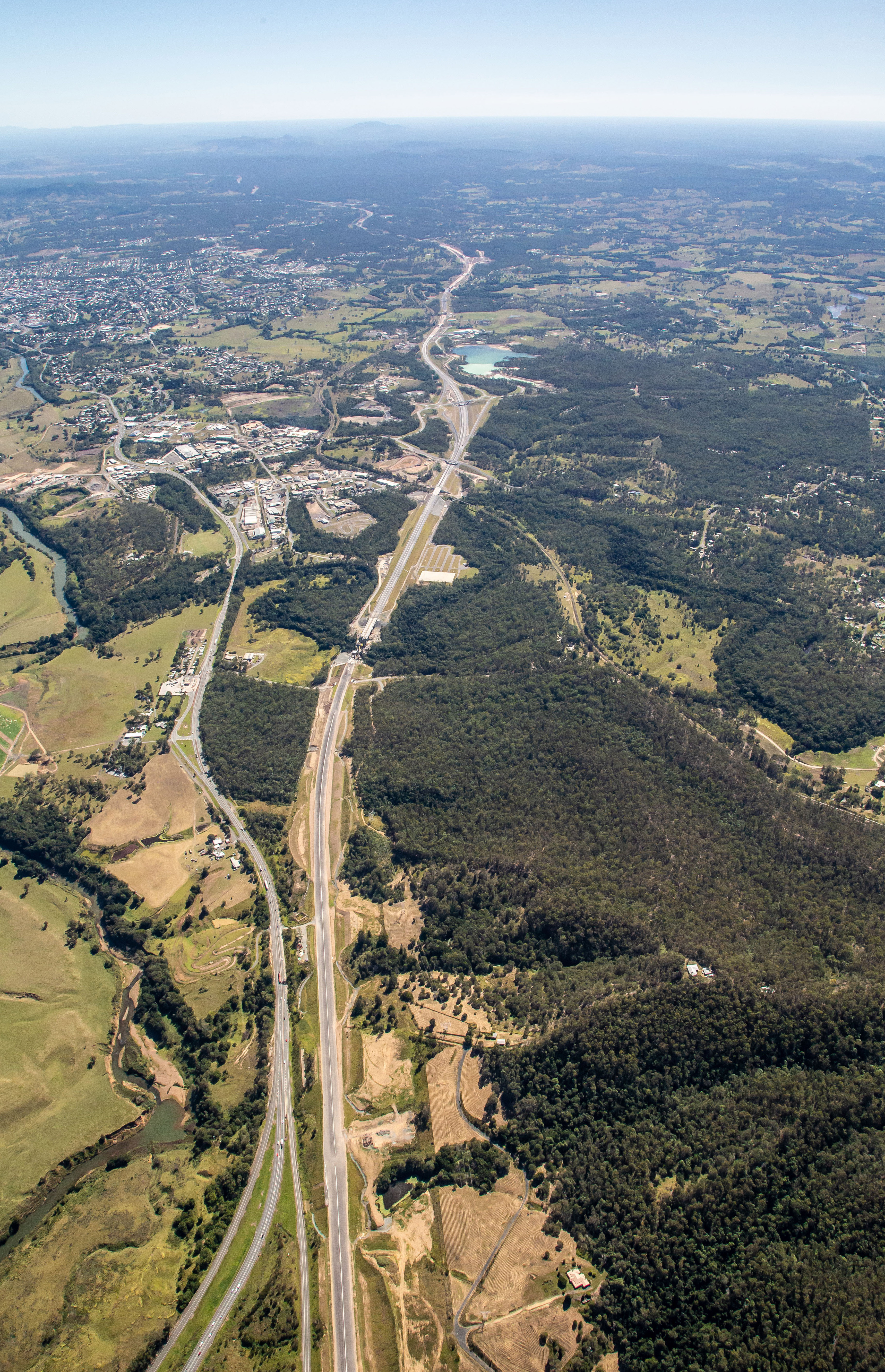Woondum interchange looking north existing Bruce Highway on left new Bruce Highway under