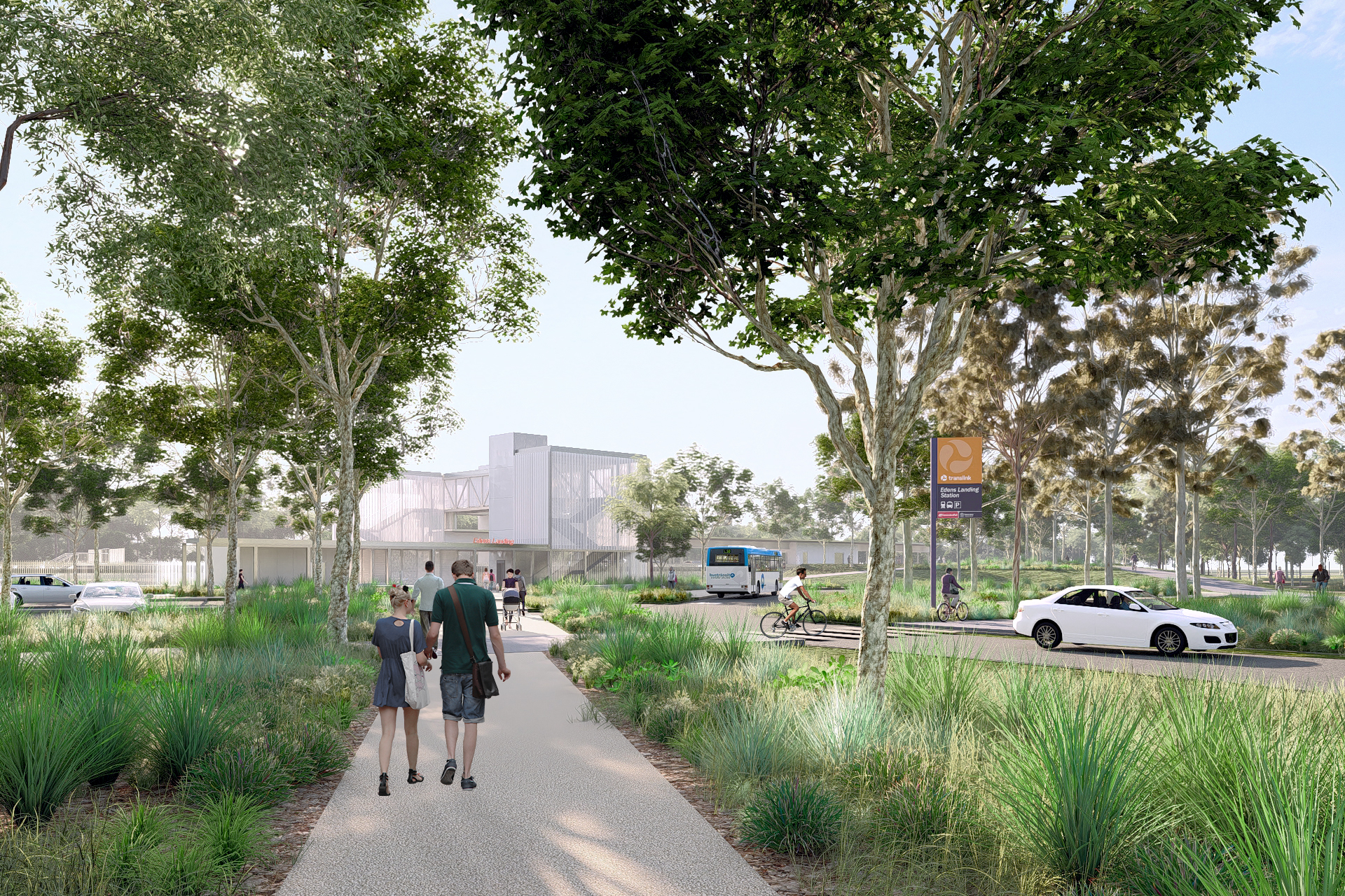 People walking along a path with the Edens landing station in the background.
