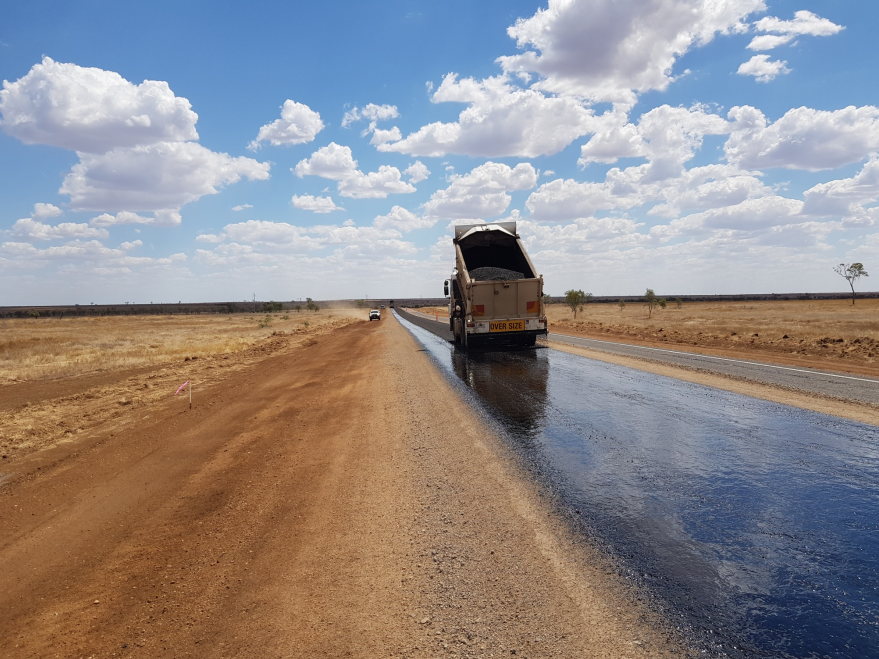 A truck performing sealing works on Flinders Highway (Hughenden–Richmond)