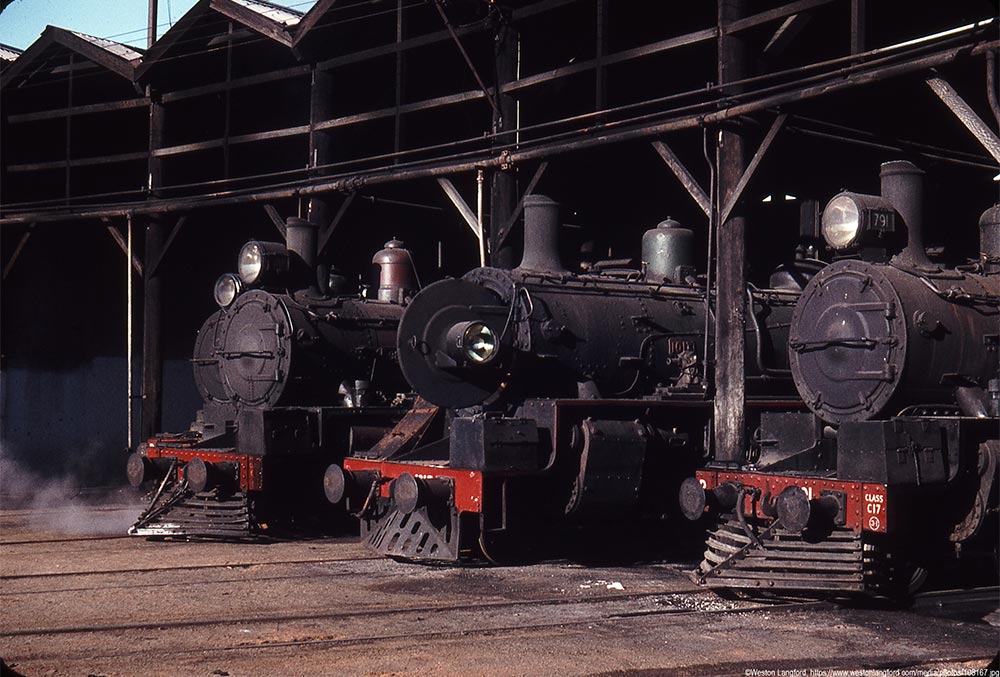 Historic image of 3 steam trains parked in the circular roundhouse Rockhampton Railyards 1966