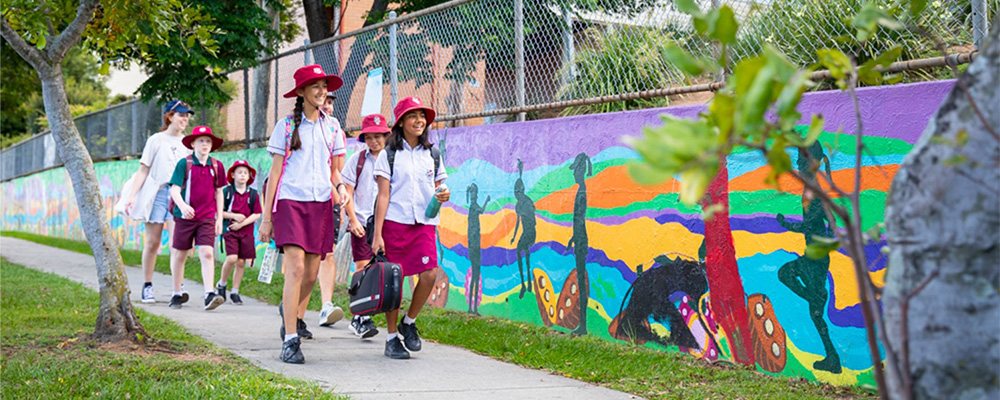 School students walking along a shared path