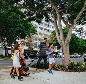 Family walking on footpath