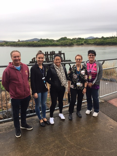 Staff at Mackay Hospital outside near the water