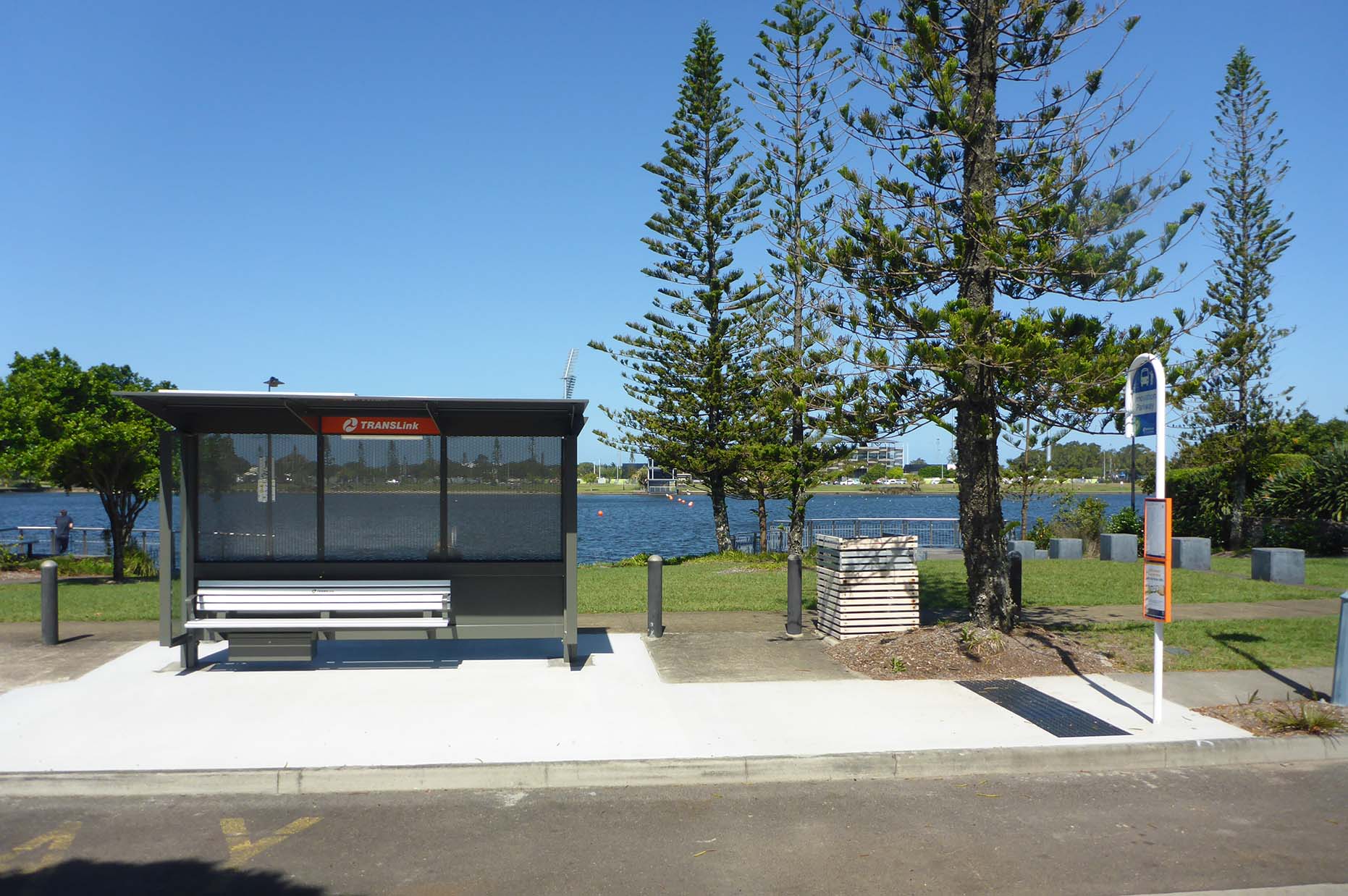 image of a bus stop and a bus shelter